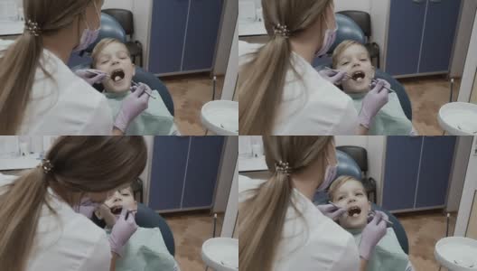 一个小男孩在牙医招待会上高清在线视频素材下载