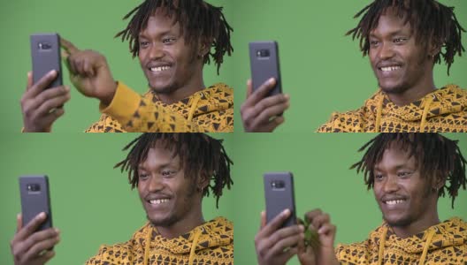 年轻快乐的非洲人使用电话高清在线视频素材下载