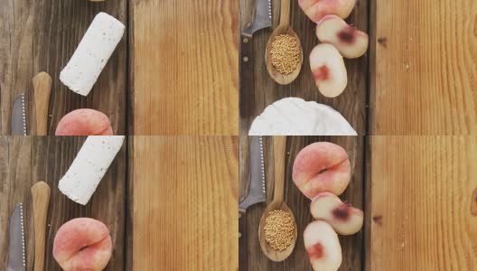 山羊奶酪，芥菜籽，小刀和桃子放在木桌上高清在线视频素材下载