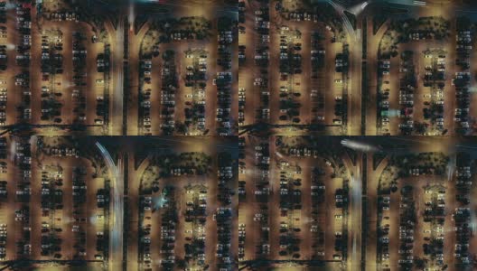 交通繁忙停车场夜间鸟瞰图高清在线视频素材下载