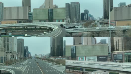 在北京CBD的主干道上行驶高清在线视频素材下载
