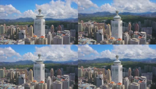 白天时间深圳城市景观著名建筑屋顶空中全景4k倾斜转移中国高清在线视频素材下载