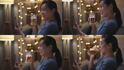 亚洲女人在智能手机上和朋友喝啤酒开虚拟派对高清在线视频素材下载