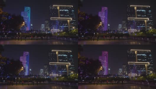 夜光照亮了杭州市中心中心公园广场上的舞者全景4k中国高清在线视频素材下载