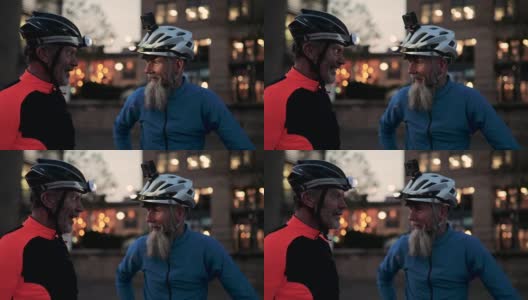 骑自行车的老年人晚上聊天高清在线视频素材下载
