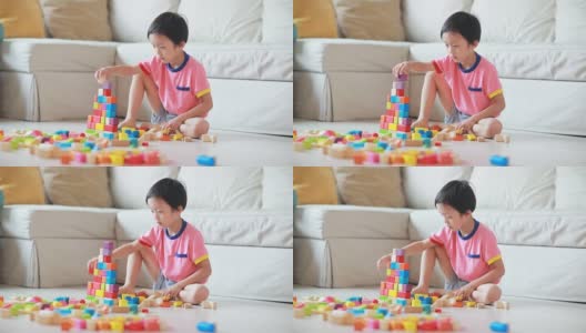 可爱的亚洲儿童玩积木高清在线视频素材下载