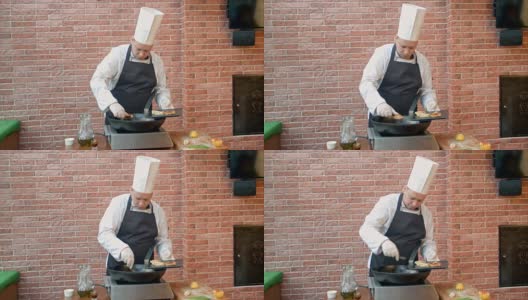 厨师把海鲜煎饺放在盘子里高清在线视频素材下载