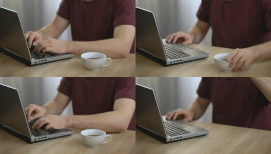 男作家在家里用手提电脑打字喝茶，自由撰稿人，记者高清在线视频素材下载