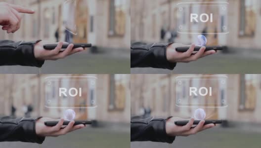 男性双手显示智能手机概念HUD全息图ROI高清在线视频素材下载