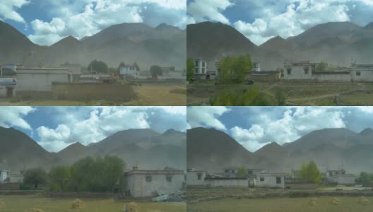 风景优美的火车经过西藏中部的一个小村庄高清在线视频素材下载