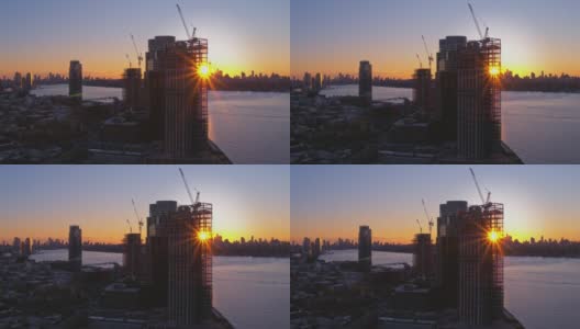 布鲁克林滨水区新建住宅楼，可以看到曼哈顿的天际线。航拍视频与向前摄像机运动。高清在线视频素材下载