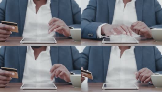 一段4k视频记录了一个不知名的商业男性在工作时使用平板电脑付款高清在线视频素材下载