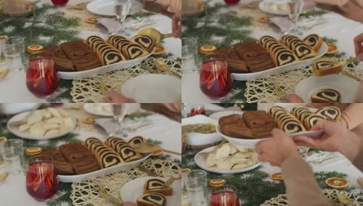 一家人分享传统的波兰蛋糕。用红色氦相机在8K拍摄高清在线视频素材下载