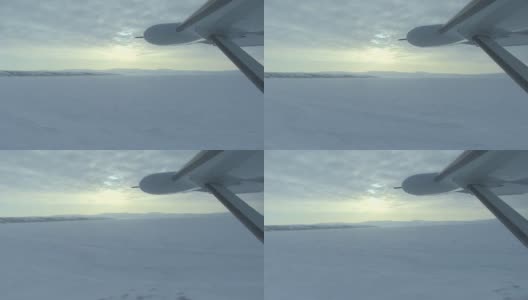小飞机窗外的雪景高清在线视频素材下载