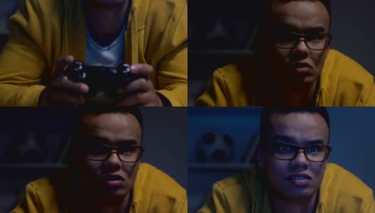非裔美国青少年晚上玩电子游戏，睡眠不规律，健康问题高清在线视频素材下载