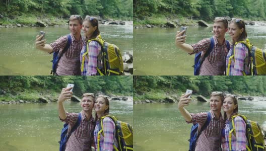 A man with a girlfriend are photographed against the background of a mountain river. On a cloudy day高清在线视频素材下载