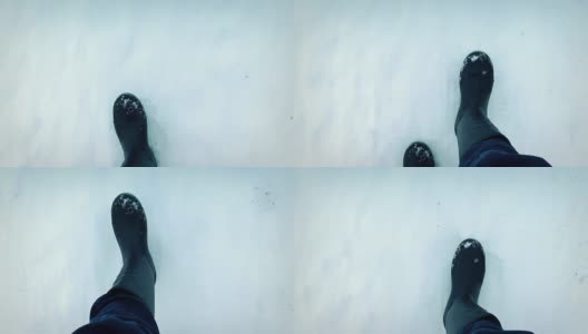 POV靴子在雪地上行走高清在线视频素材下载