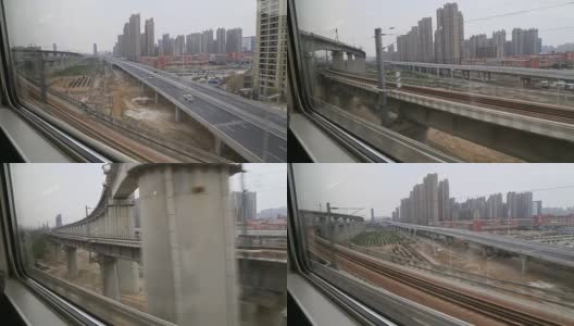 从高铁窗口望着郑州的摩天大楼高清在线视频素材下载
