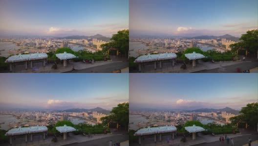 阳光明媚的傍晚，三亚著名的公园，城市景观全景4k时间的推移，海南岛中国高清在线视频素材下载