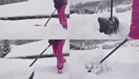 十几岁的女孩帮助清除后院的雪高清在线视频素材下载