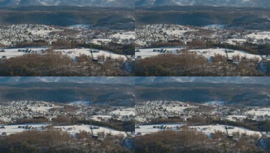 遥远的风景远鸟瞰图的美国小镇莱顿，在利哈伊山谷在阿巴拉契亚山脉，宾夕法尼亚州，覆盖着雪后的冬季风暴和降雪。高清在线视频素材下载