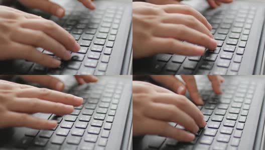 女人的手在笔记本电脑键盘上打字的特写高清在线视频素材下载