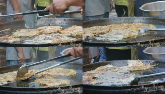热盘炒贻贝煎饼，泰国菜高清在线视频素材下载