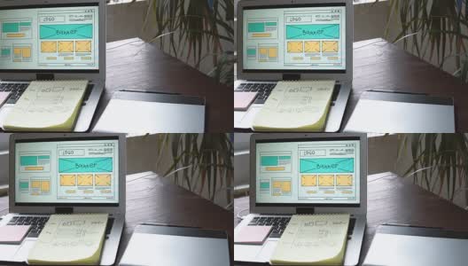 Web开发人员坐在桌子前绘制未来网站的草图。在家办公远程办公高清在线视频素材下载