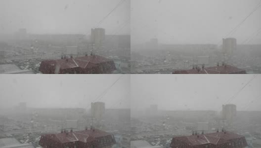 暴风雪和寒冷的冬季天气在冰城，全景高清在线视频素材下载