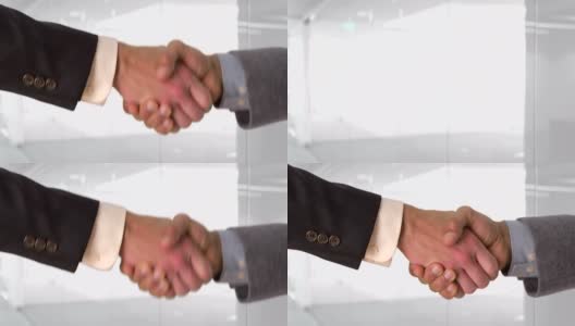 两个商人的握手高清在线视频素材下载