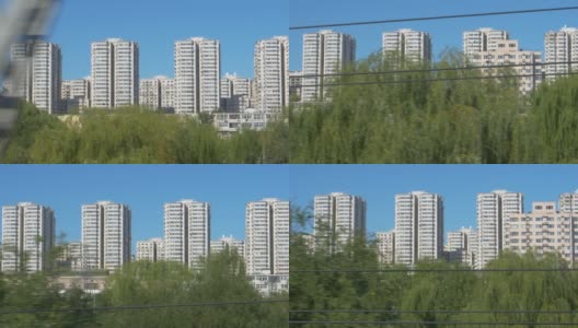 在去北京的火车上看到的高层住宅建筑。高清在线视频素材下载