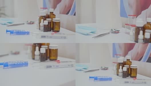 现代冠状病毒疫苗接种中心桌上摆放着医疗用品高清在线视频素材下载
