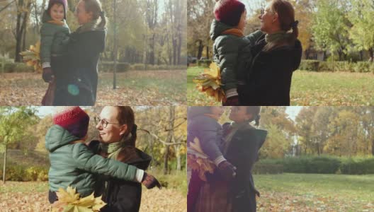 一家人在公园里享受晴朗的秋日高清在线视频素材下载