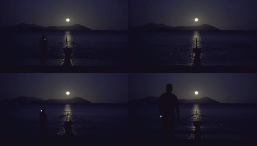 在海滩上欣赏月光高清在线视频素材下载
