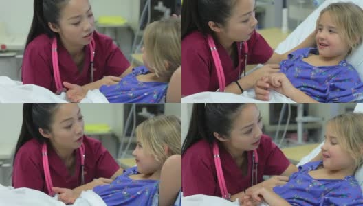 重症监护室的小女孩和女护士谈话高清在线视频素材下载