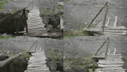 山间河流上的木桥。高清在线视频素材下载