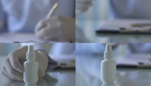 医生展示白色塑料瓶，为病人开治疗药水高清在线视频素材下载