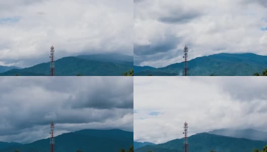 时间流逝手机塔的背景是云，雨和山。高清在线视频素材下载