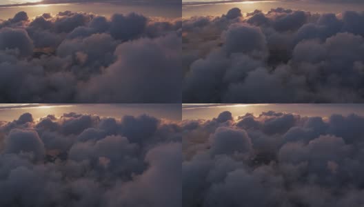 鸟瞰图的日出在云与纽约市下面。高清在线视频素材下载