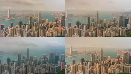 从白天到夜晚时间流逝香港城市的天际线在夜晚。从太平山顶俯瞰香港摩天大楼高清在线视频素材下载