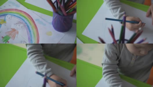 童年，艺术，教育，创意概念-学前儿童小男孩聪明的创意天才2-4岁用彩色铅笔画画家庭的春天夏天，彩虹在家里室内高清在线视频素材下载