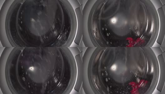 红色衣服项目在洗衣机洗涤近视图高清在线视频素材下载