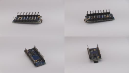 Arduino纳米微控制器板与近视图，原型板隔离在白色旋转高清在线视频素材下载