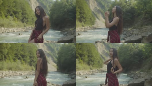 华丽优雅的深褐色亚洲女人的肖像在山的自然微笑高清在线视频素材下载