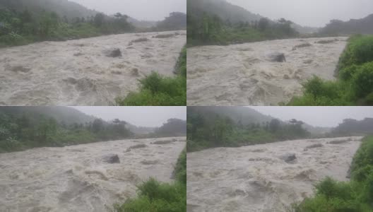 热带雨林的岩石间流淌着湍急的水流。泛滥的山洪对航道造成破坏。高清在线视频素材下载
