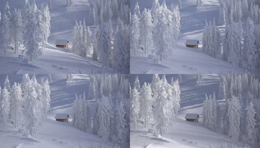 壮丽的冬季景观，群山和覆盖着积雪的冷杉树，孤立的小木屋，斜坡上的滑雪者，光影的流逝高清在线视频素材下载