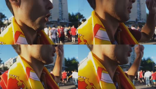 球迷用西班牙国旗包裹着高呼“奥立”，庆祝国家队的胜利高清在线视频素材下载