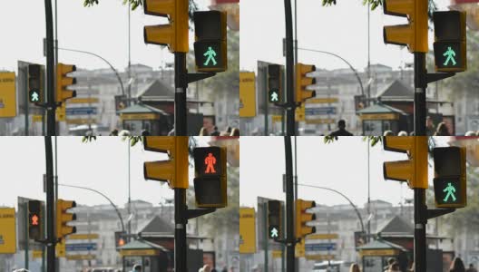 交通信号灯为行人变绿，行人过马路变红高清在线视频素材下载
