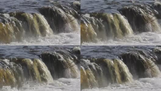 飞鱼在拉脱维亚库尔迪加欧洲最宽的瀑布。河项目。高清在线视频素材下载