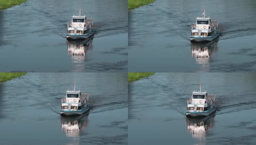 维捷布斯克,白俄罗斯。在夏季阳光明媚的日子里，漂浮在德维纳河上的游船高清在线视频素材下载